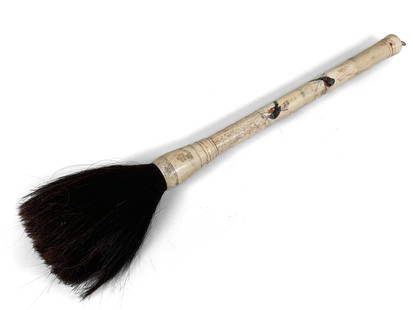 A Bone-Handled Writing Brush: L: 58 cm