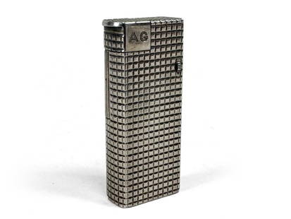A Lighter: 11 x 2.5 x 6.5 cm.