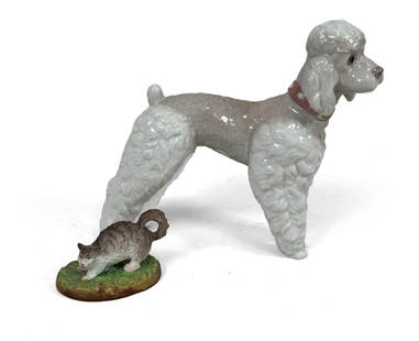 A Porcelain Dog Figurine: 14 x 15 x 6 cm.