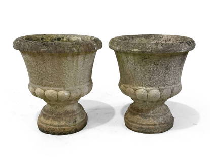 Two Stone Flowerpots: H: 43 cm D: 39 cm.