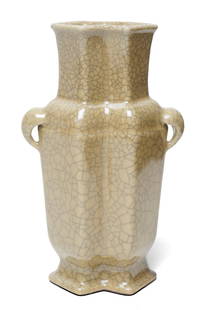 Ge-Type Crackle-Glazed Hu Vase: H: 20.4 cmA porcelain vase of hu form with twin handles, the body and neck covered in a pale beige glaze suffused with a network of dark grey crackles, imitating Ge ware, Qing dynasty style.