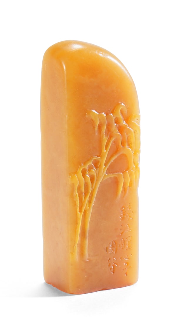 Chinese Tianhuang Stone Seal: H: 4.8 cmA rectangular tianhuang stone seal, carved in shallow relief with bamboo and inscription to one side, warm amber tone, Qing Dynasty.