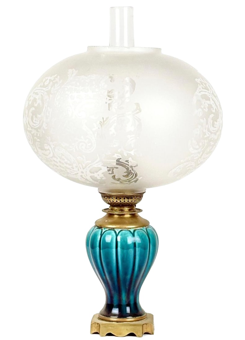 Turquoise-Glazed Oil Lamp: Height: 40 cm. Style of Théodore Deck (1823–1891). Turquoise-blue glazed ceramic and gilt metal oil lamp. Includes two glass shades (one frosted with stylized scrolls). Condition: White spots on fr