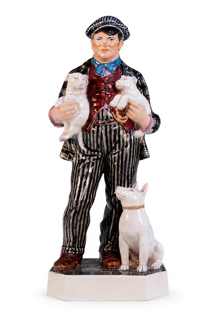 Charles Vyse, The Dog Seller: Charles Vyse (1882–1971) The Dog Seller Dimensions: Height 30.5 cm. Description: The figure is modelled as a young man in cap and coat standing beside a small dog, the painted details giving