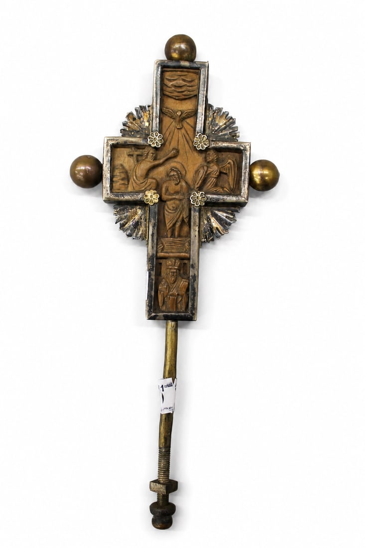 An 18th century Greek Orthodox crossl: Dimensions: Height overall 23 cm. Description: An 18th-century Greek Orthodox cross, the elongated cruciform body enriched with small terminals, engraved detail and a pendant drop. The dark patinated