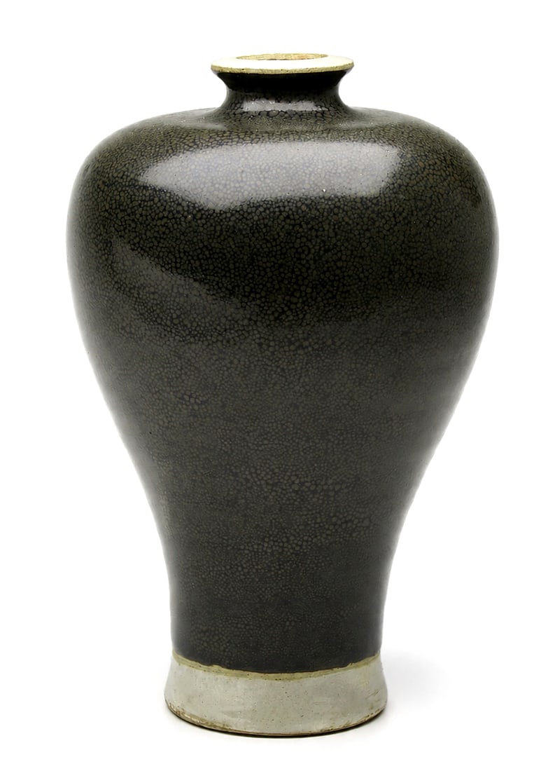 "Oil-Spot" (Jian or Cizhou style) Meiping Vase: Dimensions: Height 17.7 cm. Description: An elegant meiping (plum) vase characterized by high, rounded shoulders, a short narrow neck with an everted white-rimmed mouth, and a body tapering down to a 