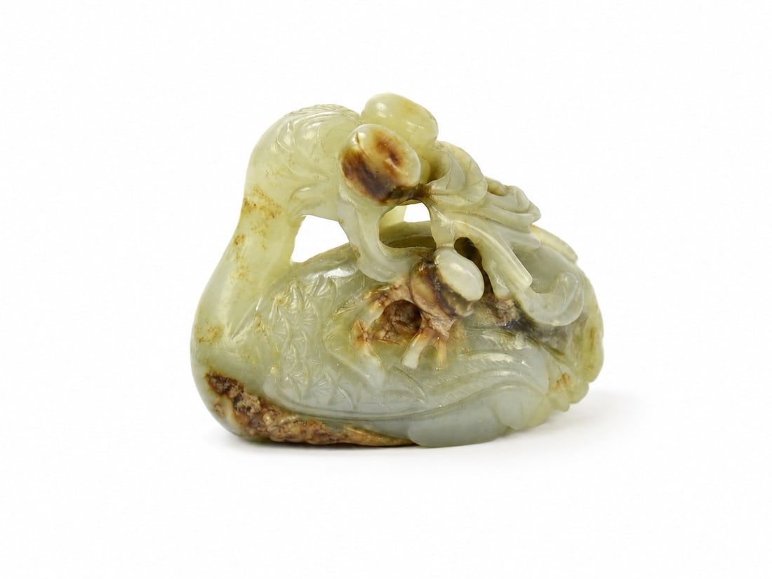 A small Chinese jade carving of a seated crane (1 of 1)