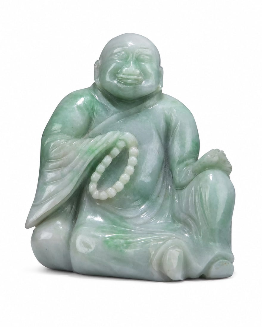 A Chinese carved jadeite figure of Budai (1 of 1)