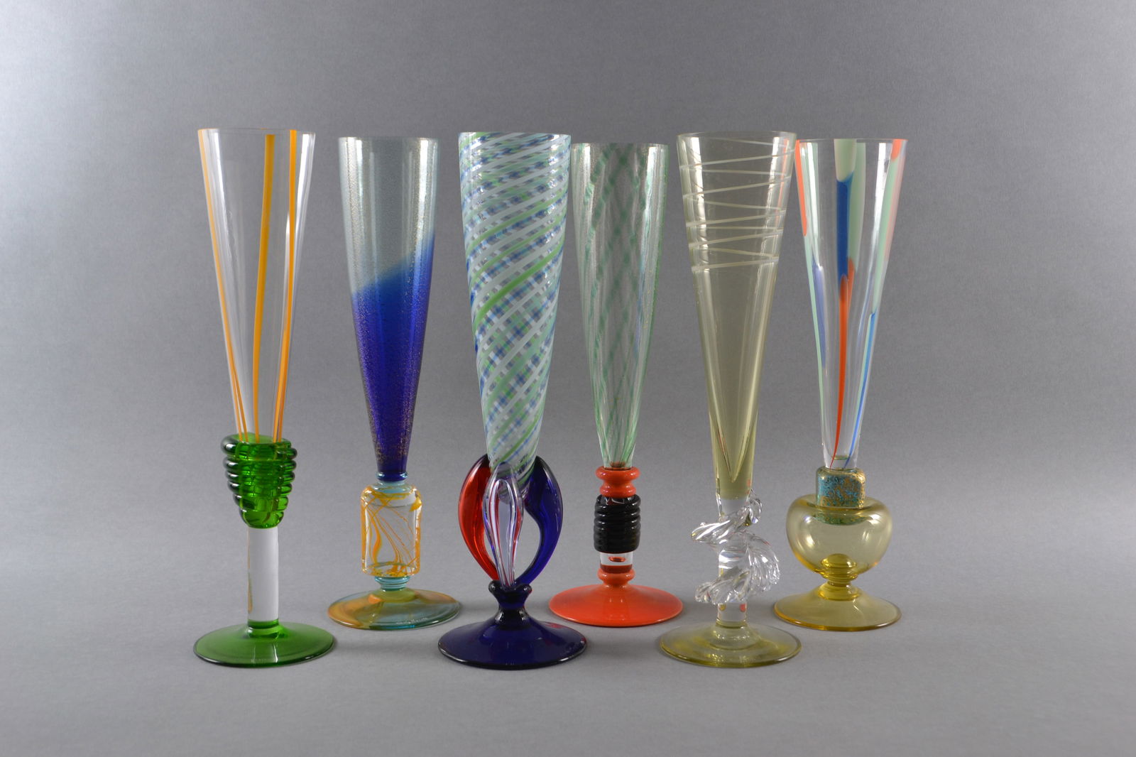 Carlo Moretti (Italian, 1934 - 2008) Italian Murano Art Glass Champagne Flutes, 1992 -1998 (6): each signed and dated on top of base, H: 10 3/4"
