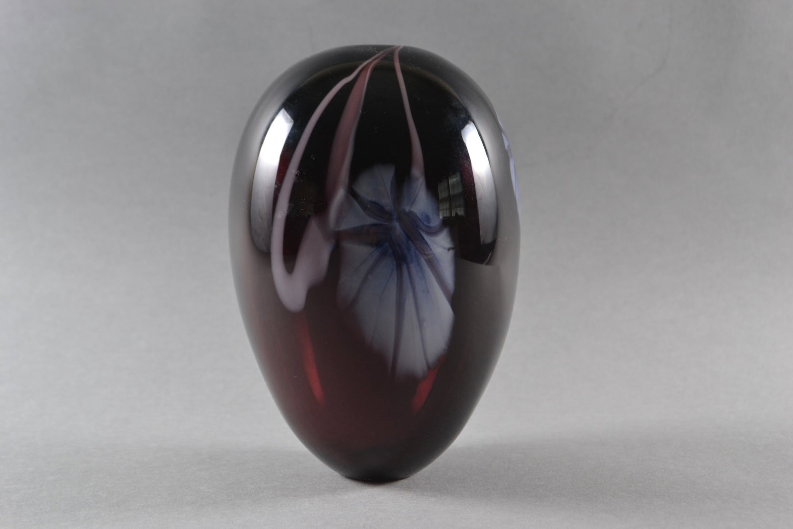 Roger Gandleman (American), Vintage Art Glass Bud Vase, 1982: Amethyst cased glass with flowers and vines ,signed Roger Gandleman, dated numbered at base, H: 6 1/2", dia: 4 1/2"