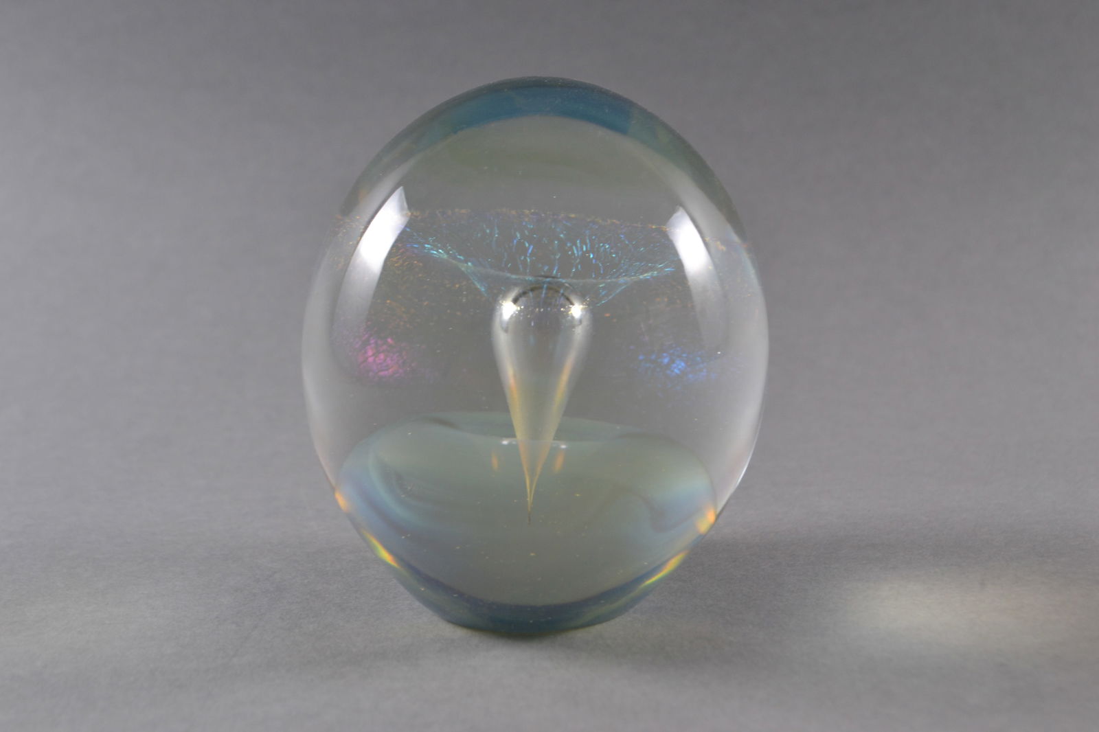 Robert Eickholt (American), Art Glass Paperweight, 1990: Clear and iridescent glass with inverted teardrop motif, signed R Eickholt and dated at base, H: 4", dia: 3 1/4"