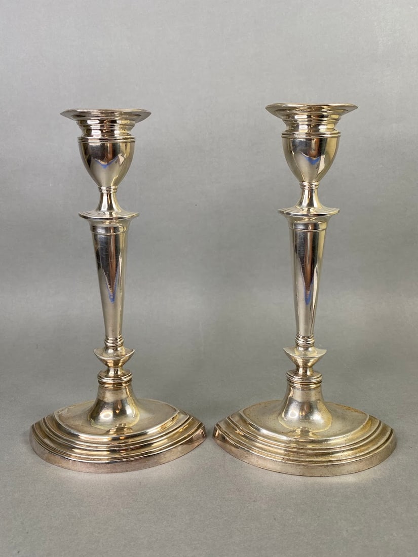 Pair Of Portuguese Sterling Silver Candlesticks: Stamped at foot, H: 9 3/4, w: 5 1/2, d: 3 1/2 inches