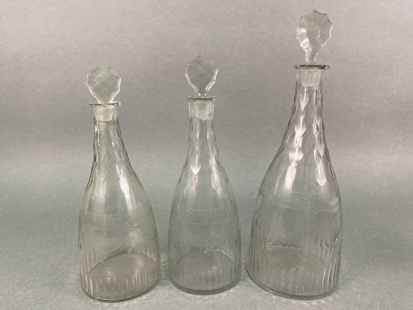 Set Of Three George III Cut And Etched Glass Decanters, Circa 1800: H: 11 1/2 inches