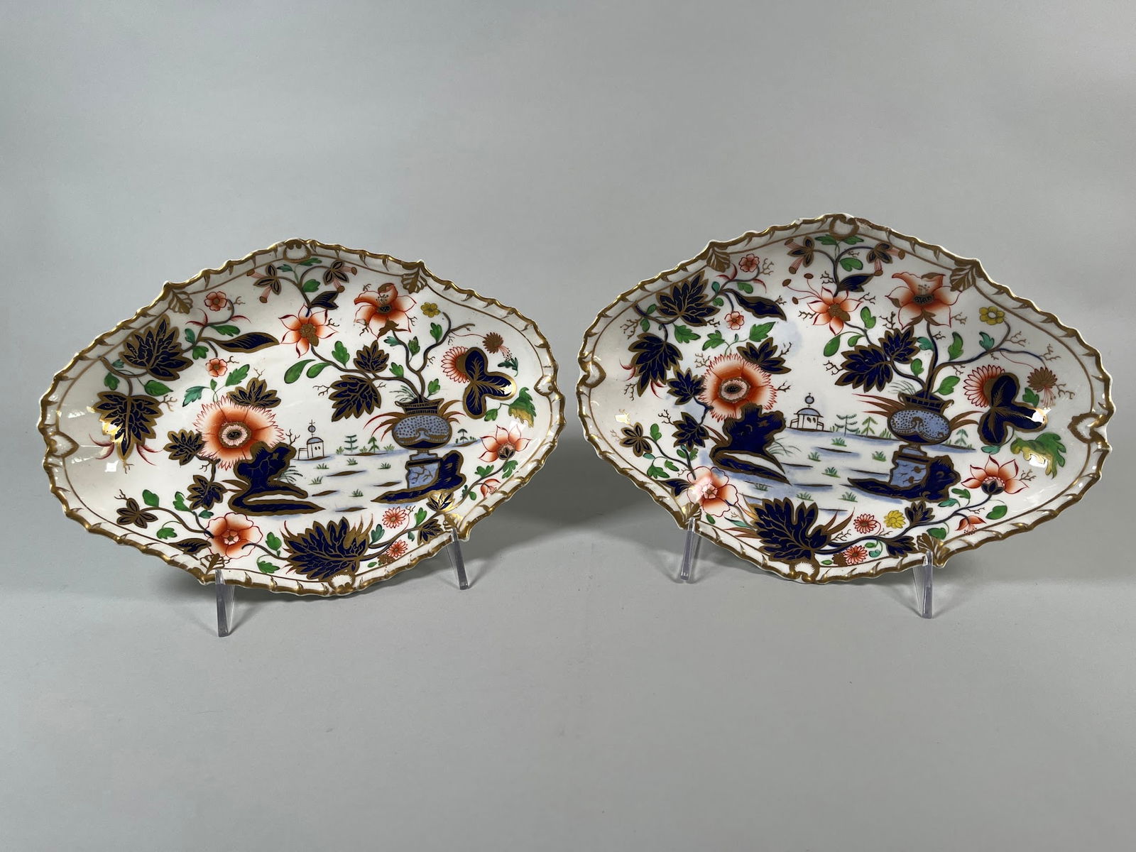 English Imari Oval Dishes (2): One chip to the foot of one plate, H: 8 x w: 10 3/4 inches