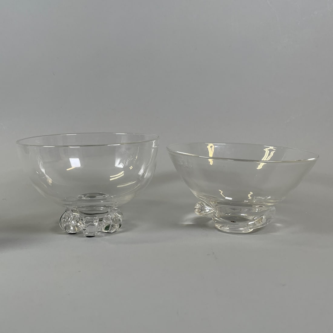 Steuben Art Class Bowls (2): Scroll foot bowl dia: 6 5/8 inches; Spiral bowl dia: 7 1/4 inchesCONDITION: foot is chipped on Spiral bowl