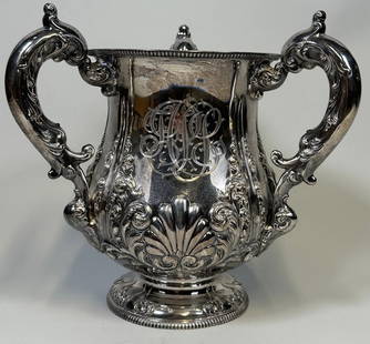 Victorian Bailey, Banks & Biddle Sterling Silver Three-handle Trophy Cup: Hallmarked under foot monogrammed H: 10 x dia: 10 inches (inclusive of handles) OZT: 48.48