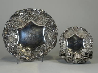 Sterling Silver Monogramed Nut Bowls (7): Monogrammed S Hallmarked at underside Large bowl - Dia: 6 inches; Smaller bowls - Dia: 3 1/2 inches OZT: 5.947