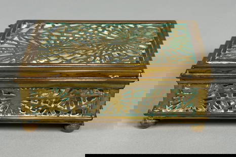 Tiffany Studios Pine Needle Bronze And Glass Box, Circa 1910: Stamped on underside: Tiffany Studios / New York / 800 H: 1 1/2 x w: 4 x d: 3 inches