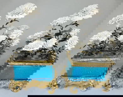 Pair Of Continental Gilt-bronze-mounted Porcelain Flower Arrangement: Porcelain flowers set into turquoise glazed stoneware boxes mounted with gilt bronze; not of the period; unmarked H: 10 3/4 x w : 6 1/4 x d: 5 3/4 inches (overall)