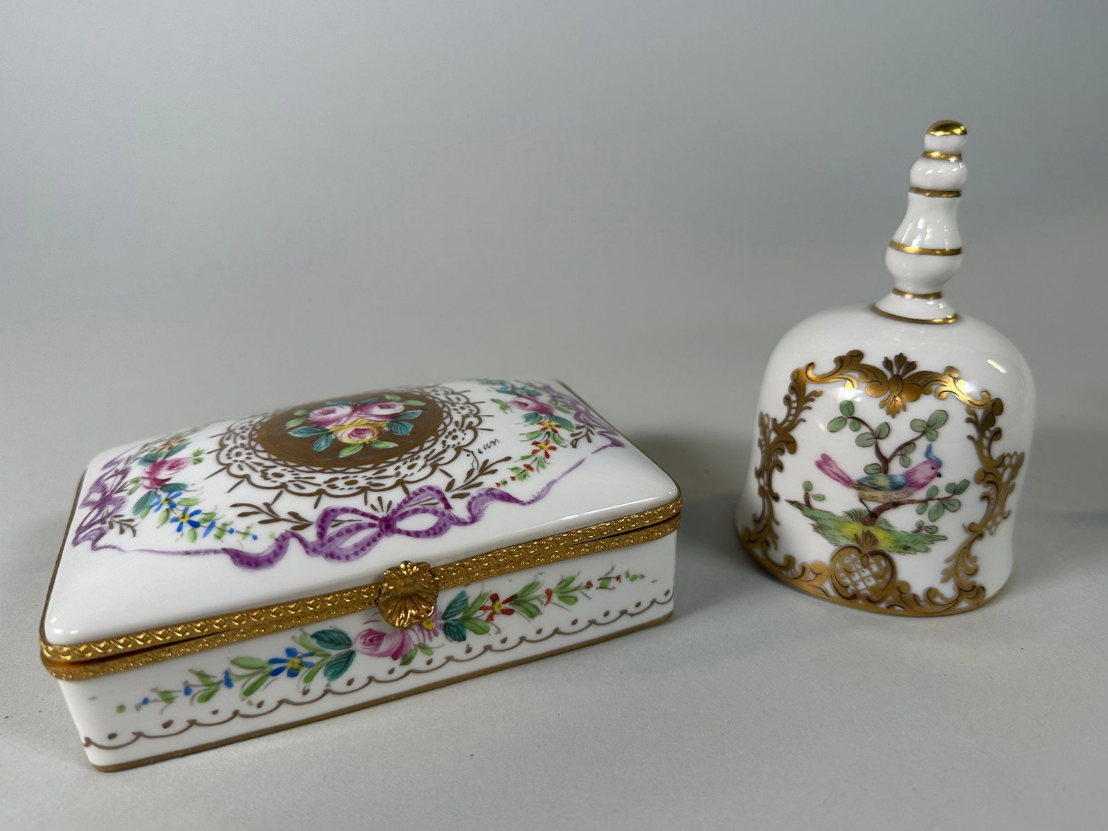 Handpainted Porcelain Parisian Trinket Box And Dresden Bell: Bell stamped - h: 4 inches; Box stamped - h: 2 x w: 5 x d: 3 inches