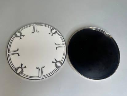 Sterling Silver Mounted Trivets (2): Both marked sterling along side rim - dia: 8 inches