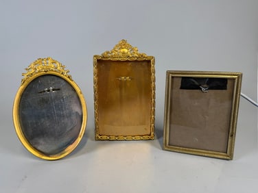 Three Gilt-metal Picture Frames