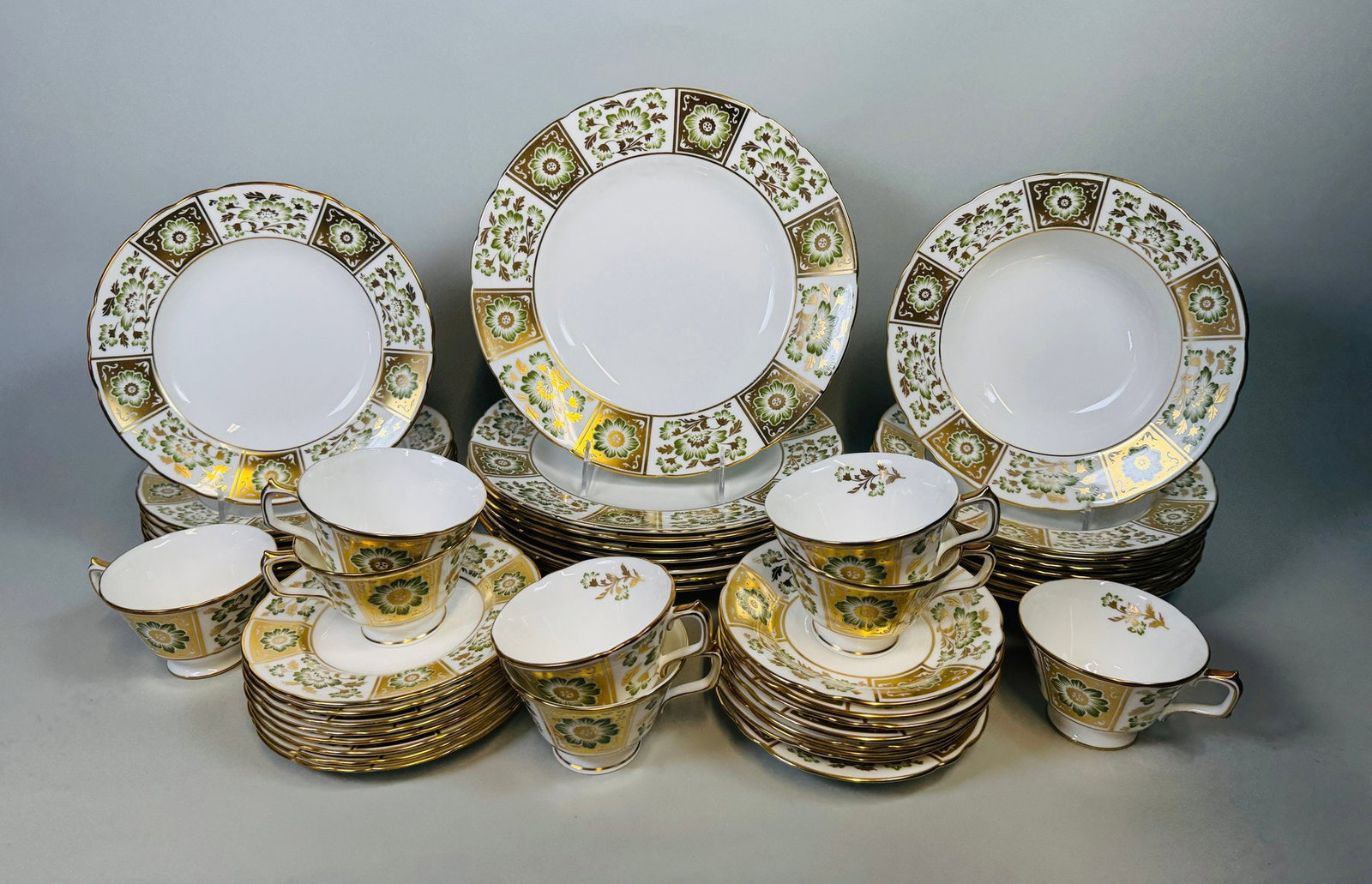 Royal Crown Derby 'Derby Panel Green' 48-Piece Part Dinner Service: 8 - Dinner Plates Dia.: 10 1/2 inches8 - Bread and butter plates Dia.: 6 1/4 inches8 - Salad Plates Dia.: 8 1/2 inches8 - Soup dishes 8 1/2 inches8 - Cups -H: 2 1/2 inches8 - Saucers Dia.: 6 inches