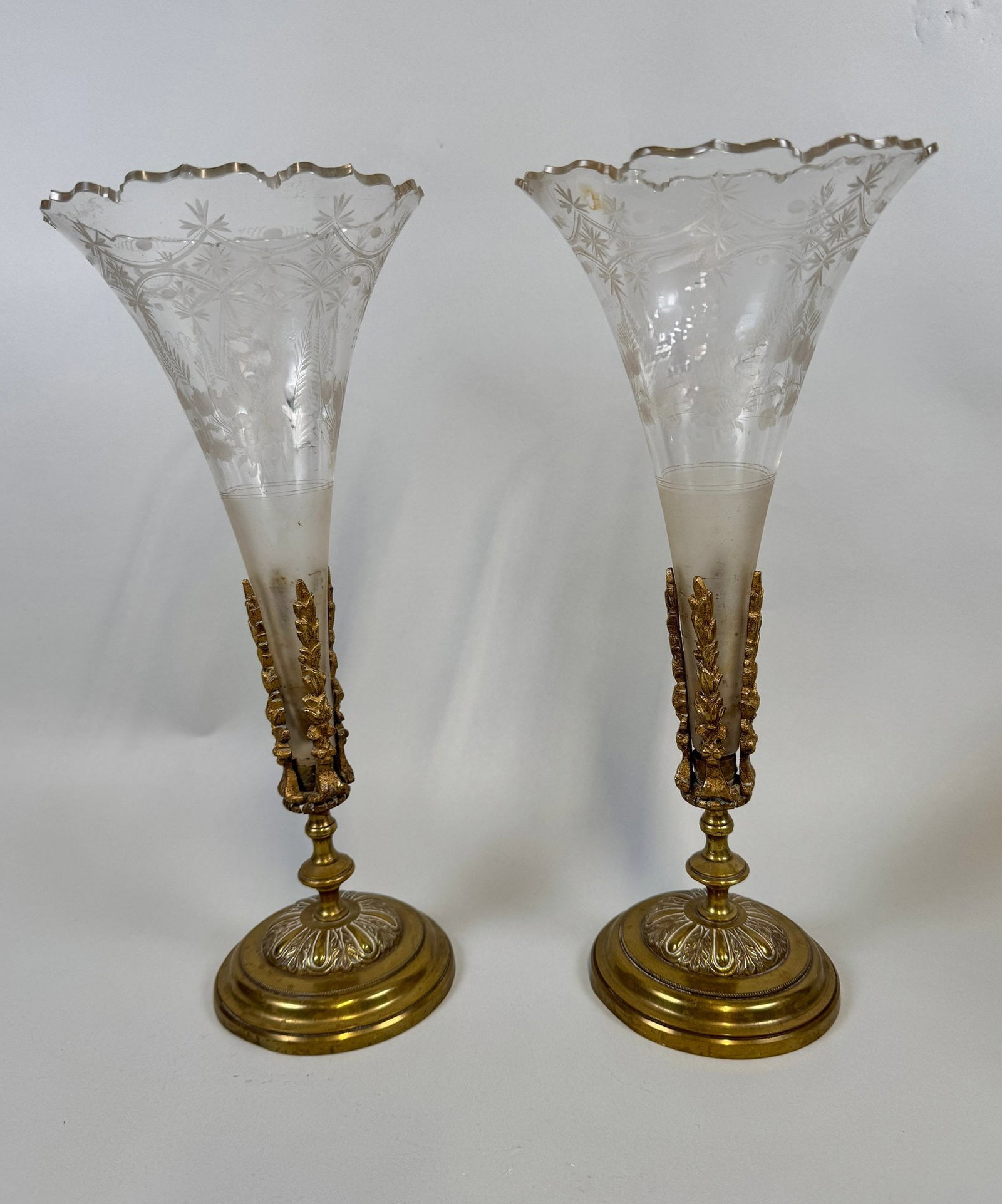 Pair Of Crystal And Bronze/Brass Trumpet Vases: H: 13 x dia (top): 5 1/4 x dia (base): 4 1/8 inchesCONDITION: glass insert sits askew in one vase