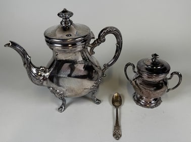 Peruvian Sterling Silver Teapot And Covered Sugar Bowl Together With A Wallace Sterling Silver Spoon