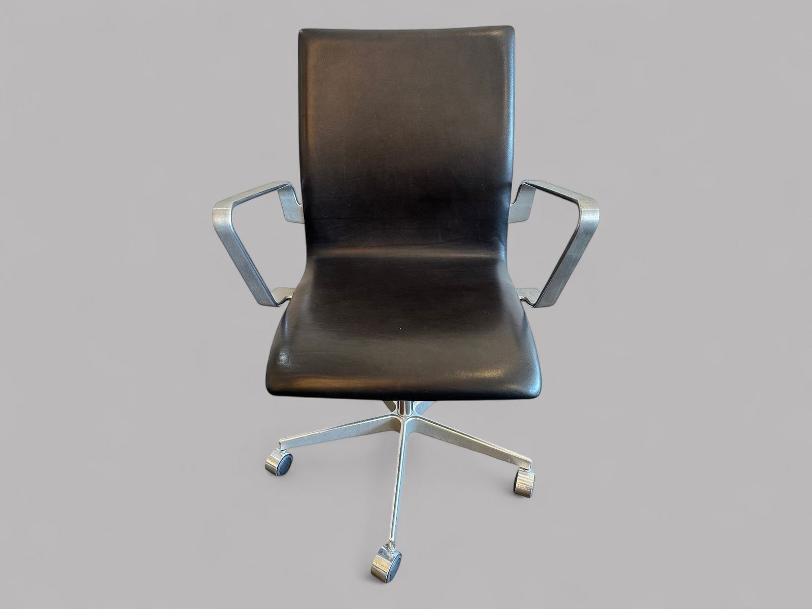 Arne Jacobsen (Danish, 1902-1971) For Fritz Hansen Oxford Office Chair: H: 35-40 x 24 1/2 x d: 24 inches; seat h: 16-21 x d: 17 1/2 inches