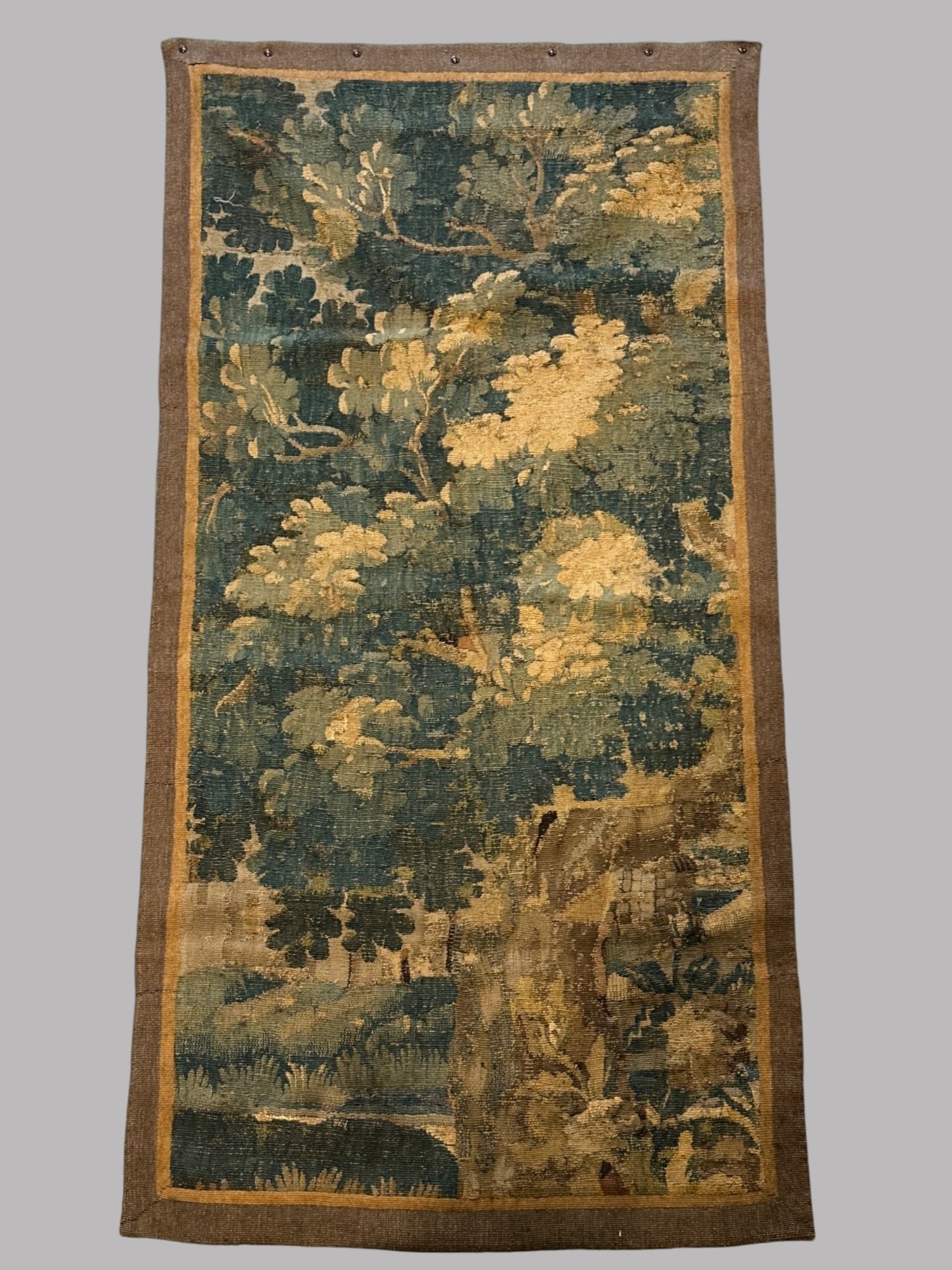 Flemish/Belgian Tapestry Panel, 16-17th Century: 20x70 inchesCONDITION: old linen backing; border seems original or at least early; scattered small holes and old repairs