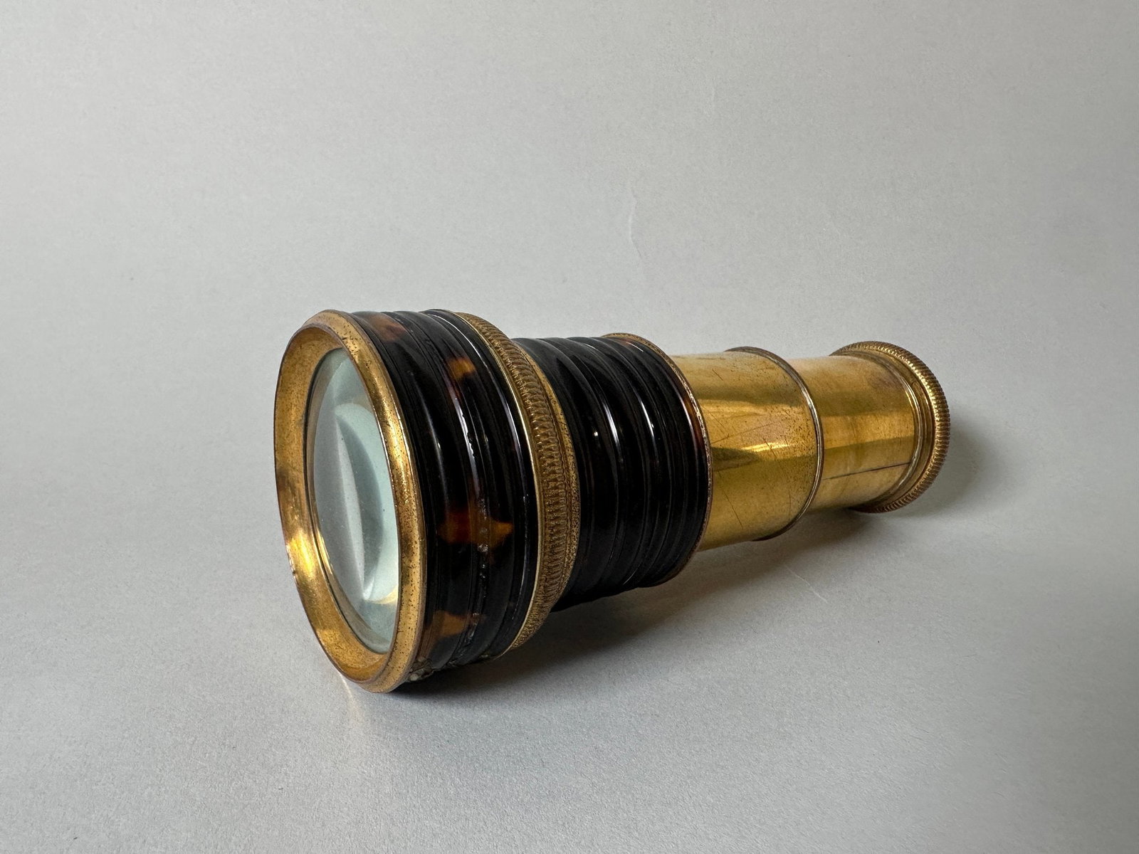 French Gilt Brass Spyglass By Bautain (Paris), Mid 19th Century: signed Bautain/Brevete/A Paris Height: 2 1/2 inches Fully Extended: 5 inchesCONDITION: good condition glass in good condition