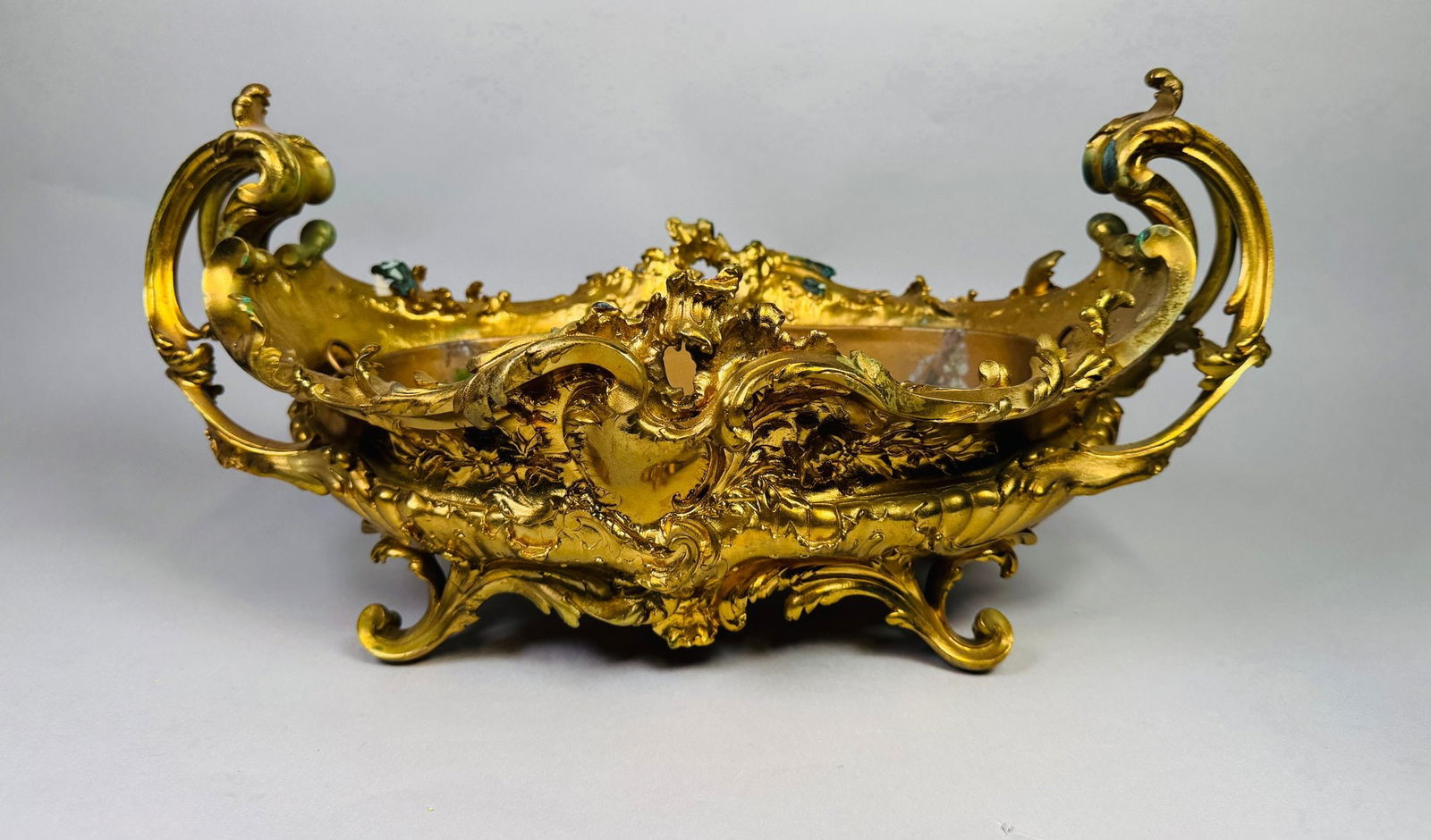 French Gilt Metal Centerpiece, C. 1900: with removable liner impressed numerals to underside H: 8 3/8 x W: 16 inches