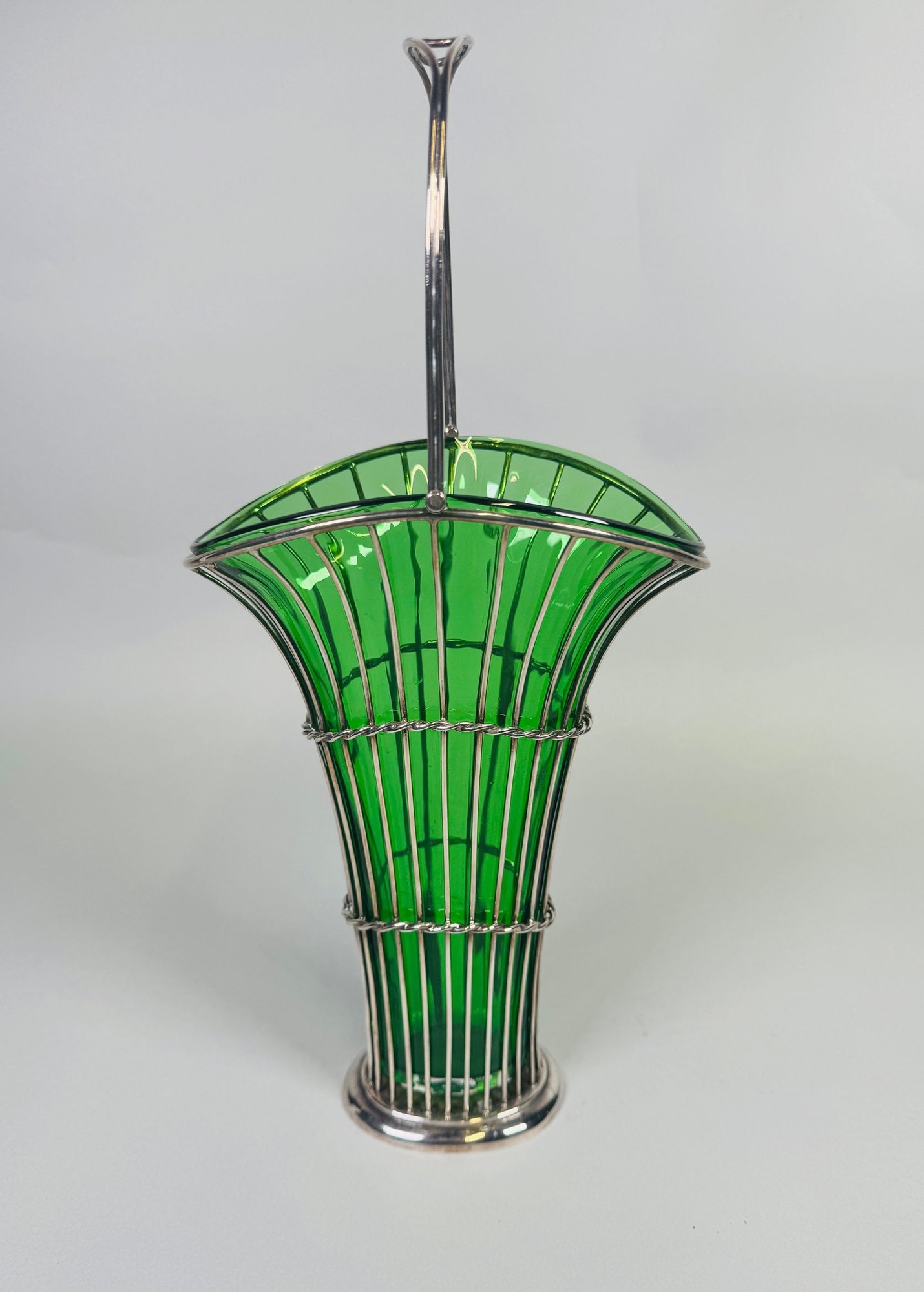 Edward VII (London, 1907) Sterling Silver And Green Glass Flower Basket: hallmarked on basket rim and handle H: 10 5/8 with handle downCONDITION: glass in good condition