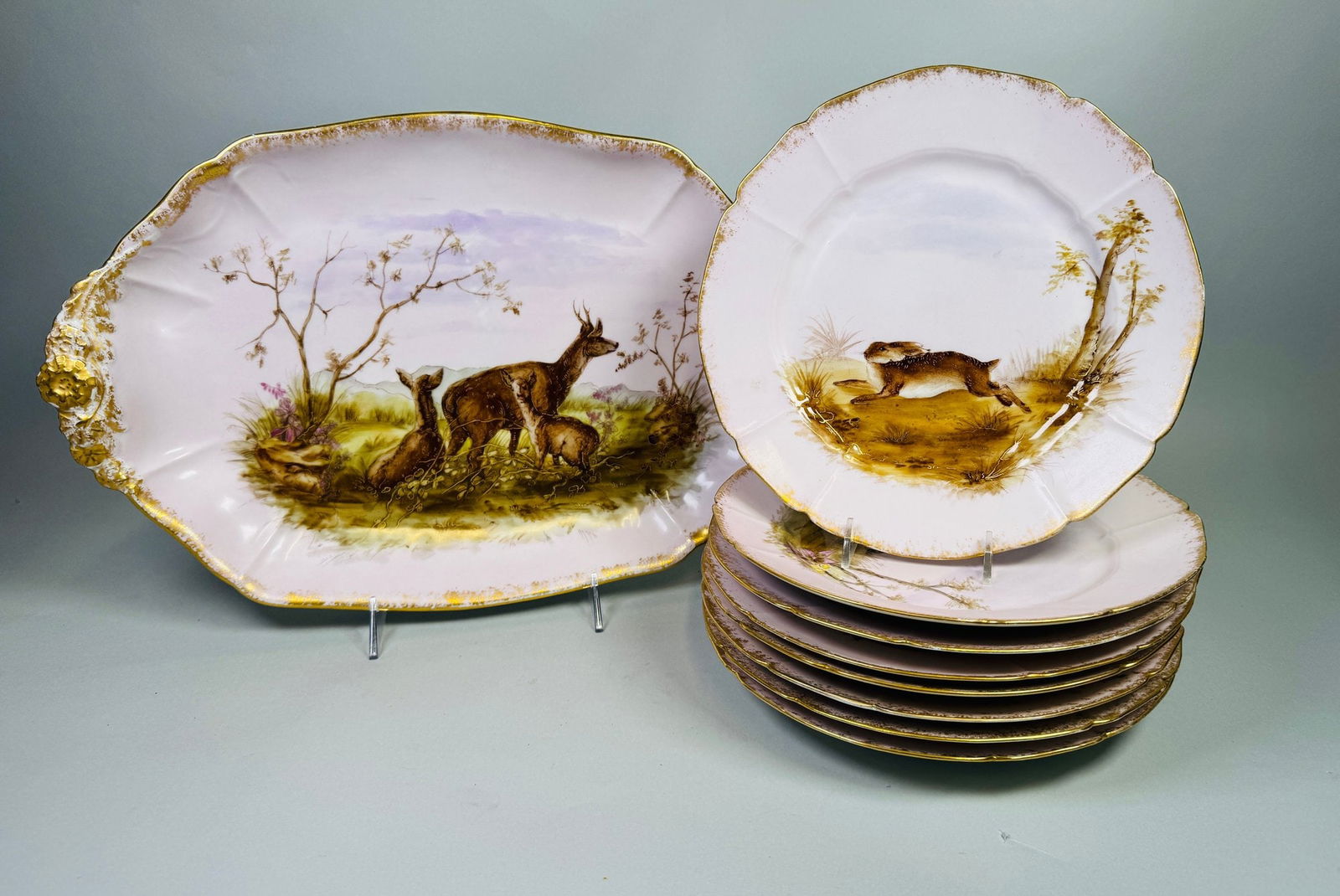 Limoges France Hunt Themed Dinner Plates With Serving Platter, C. 1890 (9): mark for G.D. & Co. (G. Demartine & Cie) Limoges 8 plates - Dia: 9 1/4 inches 1 serving platter - 16 1/2 inchesCONDITION: One plate has a with chip; another plate been broken in half and re-st