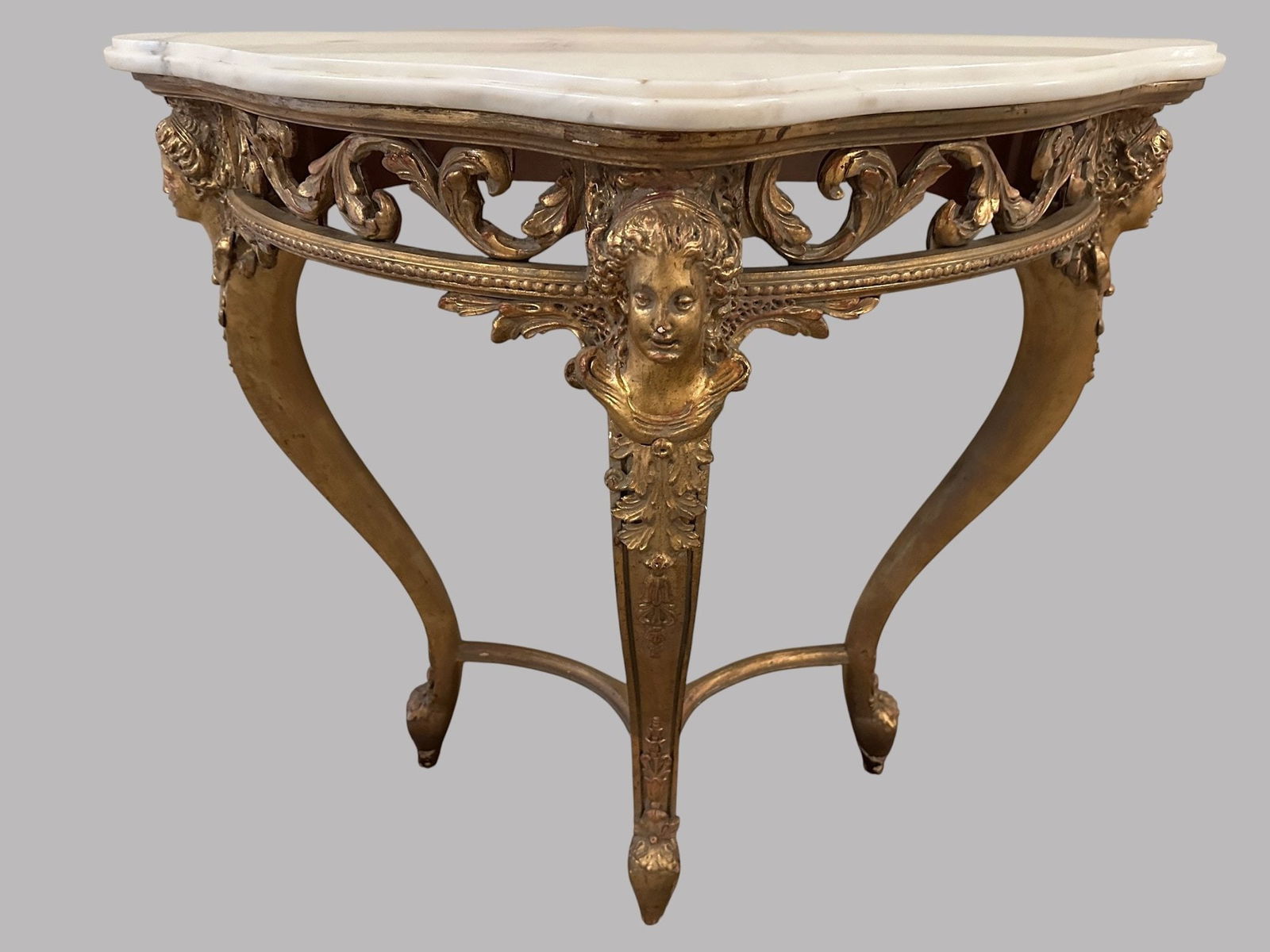 Classical Revival Style Giltwood And Marble Top Demilune Console: With caryatid legs h: 32 x w: 34 x d:15 inchesCONDITION: minor chips at feet gilt losses overall