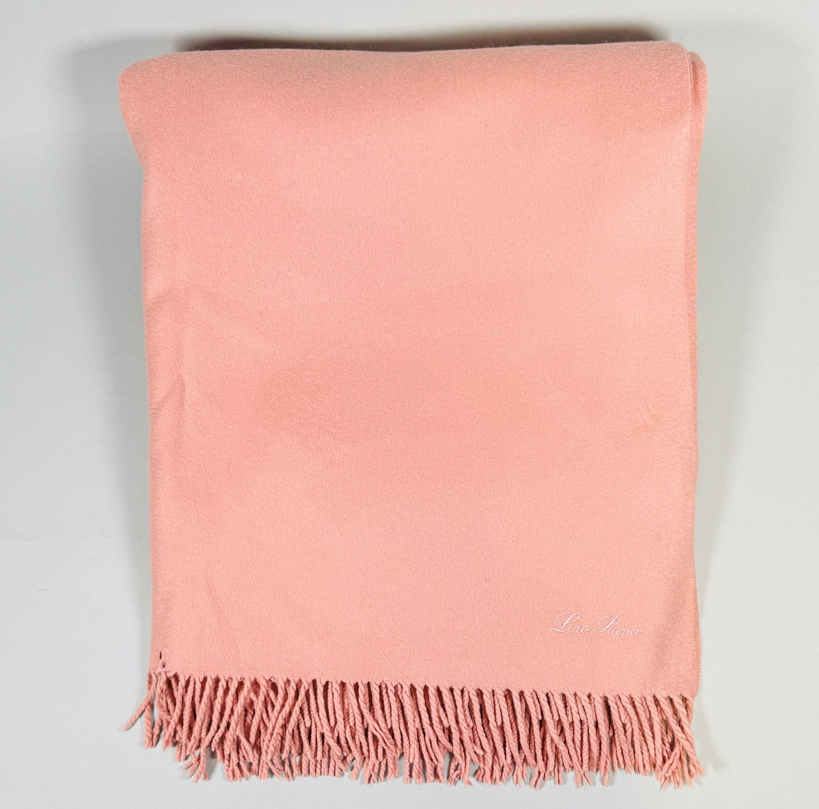 Loro Piana Coral/peach Cashmere Throw Blanket: 78 x 55 1/2 inches. CONDITION: two small moth holes and two holes at border; does not come with box