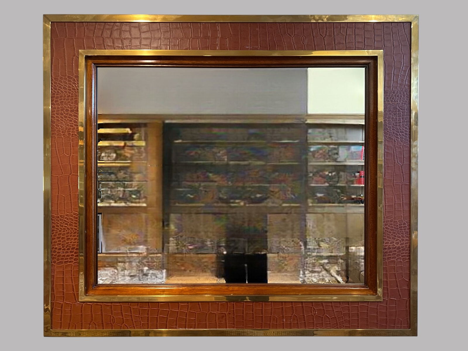 Ralph Lauren Modern Equestrian Mirror: having brown crocodile embossed leather and brass trim H: 43 x w: 50 x d: 2 1/2 inchesCONDITION: excellent