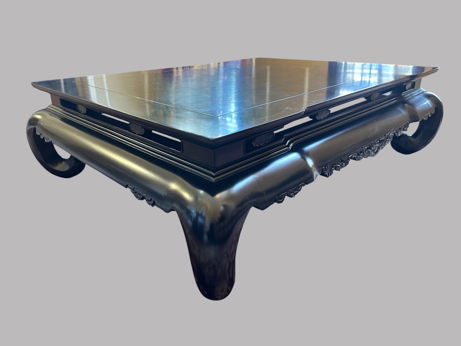 Ralph Lauren Beekman Black Lacquered Cocktail Table: with hand carved decoration H: 17 1/2 x w: 60 x d: 47 1/2 inchesCONDITION: excellent some scratching to the top of the table