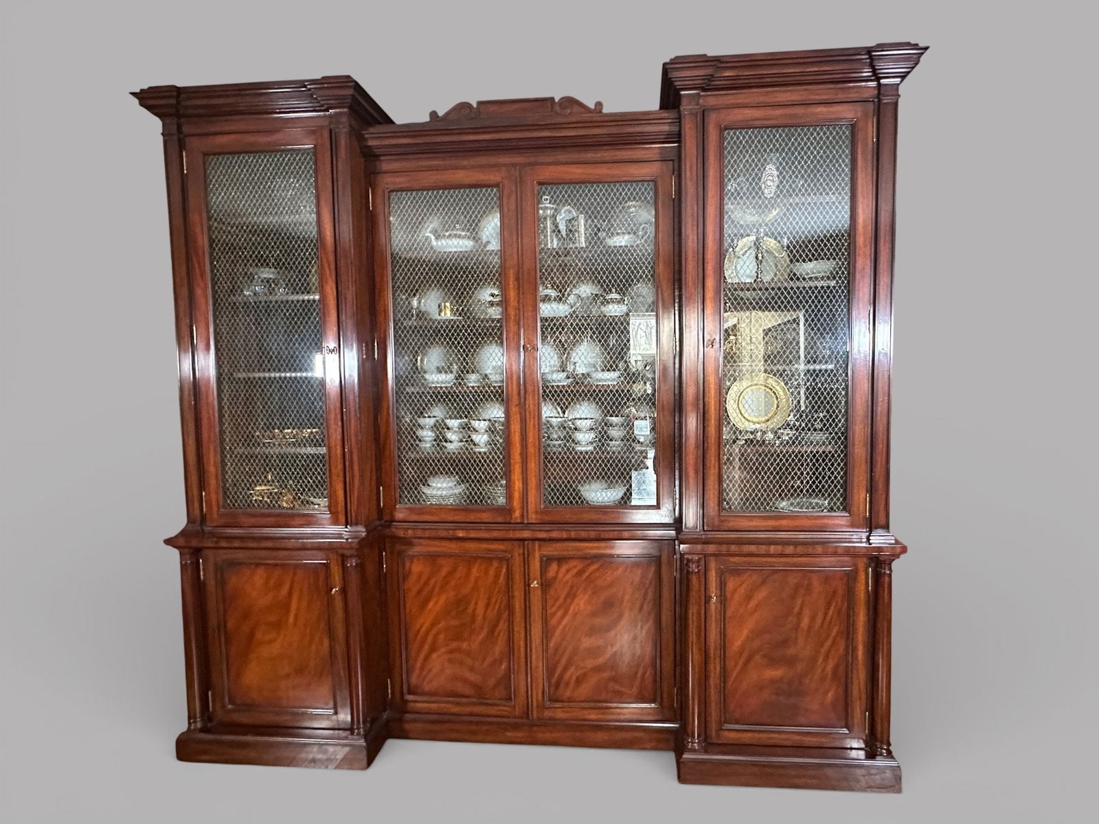 Ralph Lauren Noble Estate Bunching Mahogany Veneered China Cabinet: H: 92 1/2 x w: 98 1/2 x d: 23 3/4 inchesCONDITION: excellent