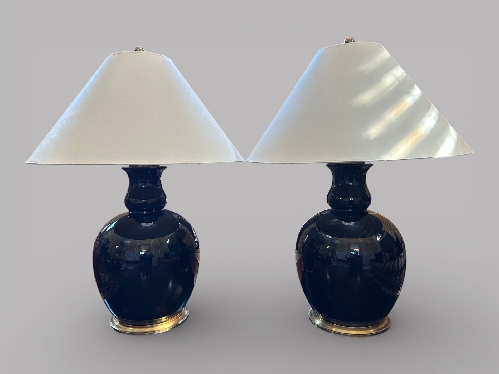 Pair Of Ralph Lauren Black Glazed Malin Ming Ceramic Lamps (2): Ralph Lauren stamped into base H: 33 (to the finial) w: 14 (overall)CONDITION: Excellent