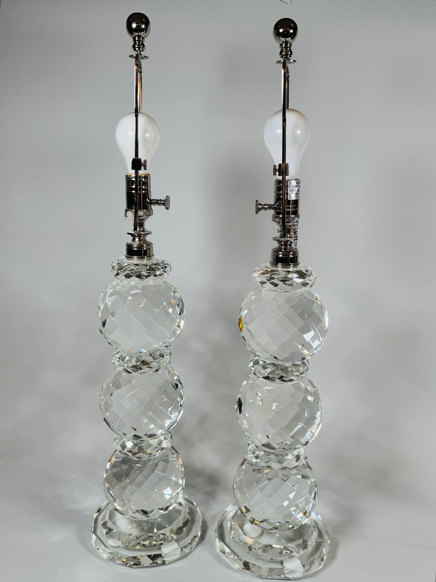 Pair Of Ralph Lauren Daniella Clear Faceted Crystal Prism Lamps: Ralph Lauren acid etched into the base H: 30 1/2 (to finial) x w: 7 1/2 inches (at base)