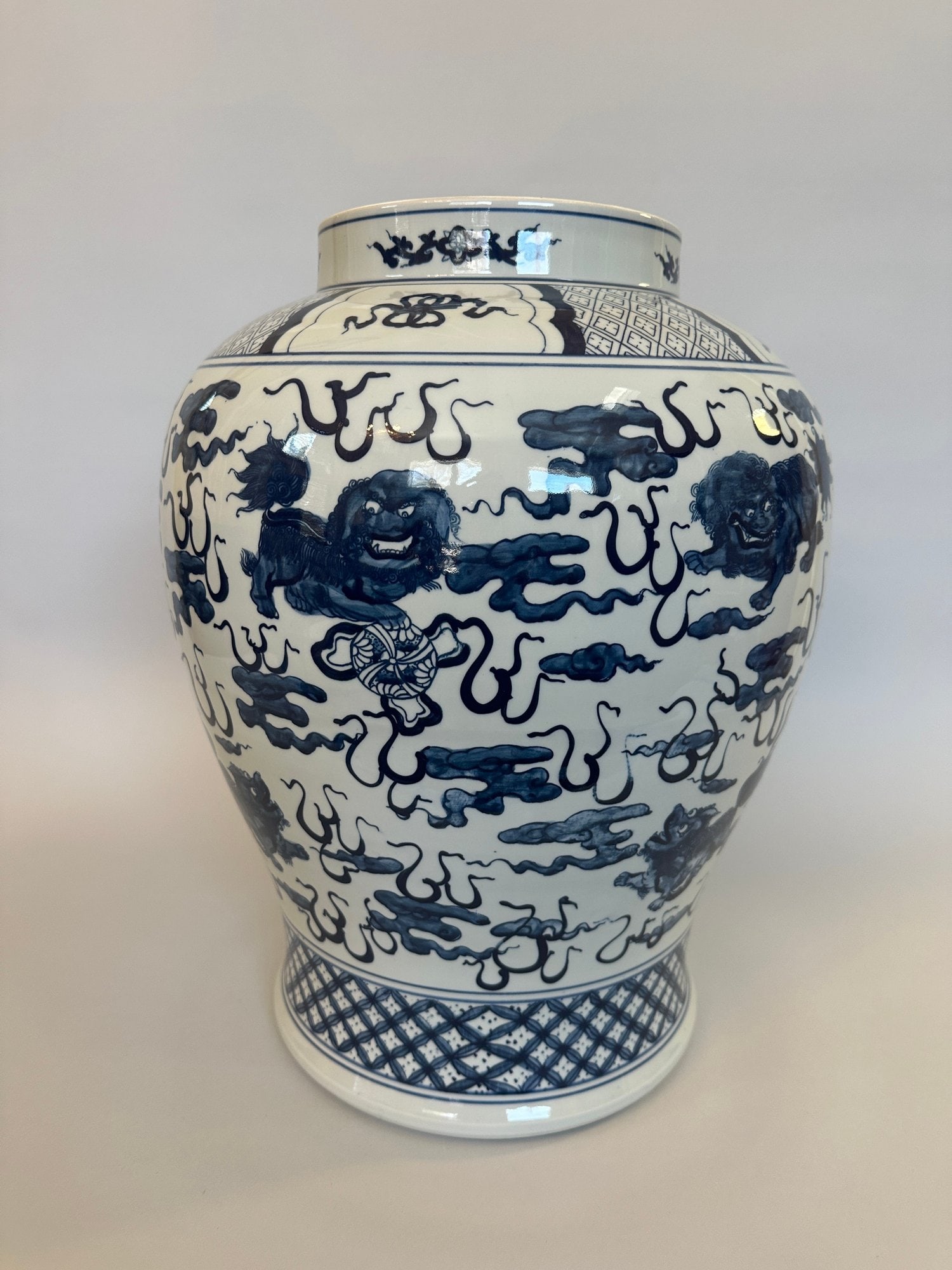 Ralph Lauren Chinese Blue And White Chinoiserie Style Yvonne Foo Dog Vase: stamped Ralph Lauren on underside made in China H: 14 x w.: 12 inches CONDITION: Excellent