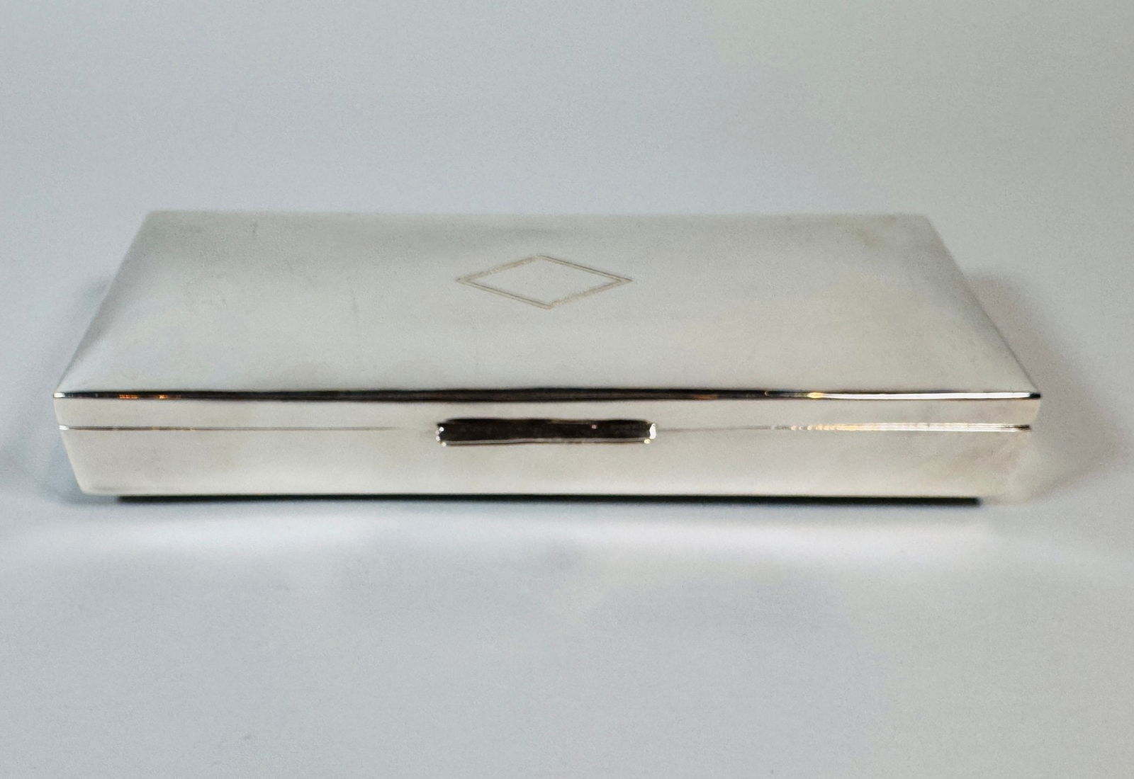 Ralph Lauren Silver Plate Table Box: H: 1 1/2 x w: 9 3/8 x d: 3 5/8 inchesMarked Ralph Lauren on underside CONDITION: some scratching on surface
