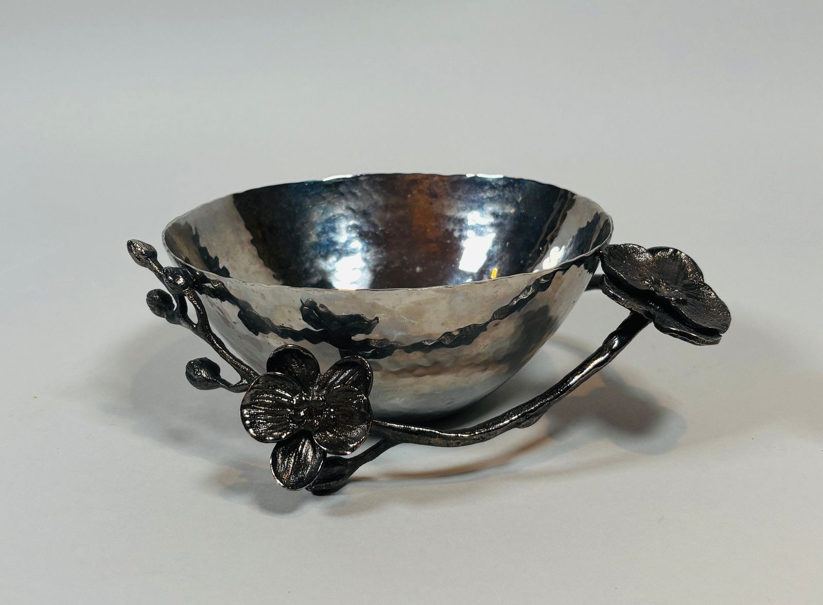 Michael Aram Black Orchid Nut Bowl: Signed underneath h: 2 1/4 x w: 5 1/4 x d: 5 1/4 inchesCONDITION: excellent
