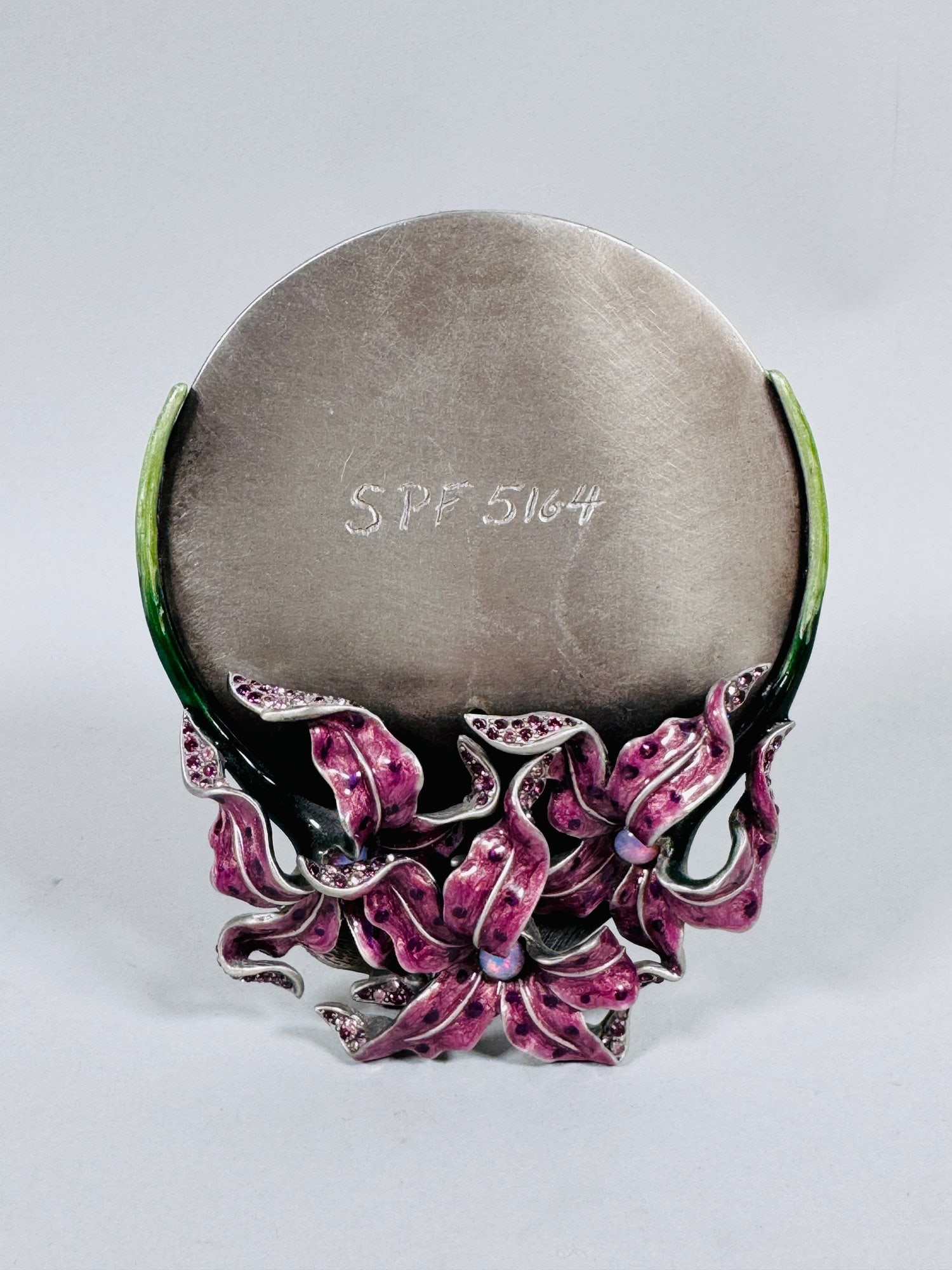 Jay Strongwater Stargazer Lily Picture Frame: marked on back h: 5 x w: 4 inches (oveall) h: 3 1/2 x w: 3 1/2 inches (opening)