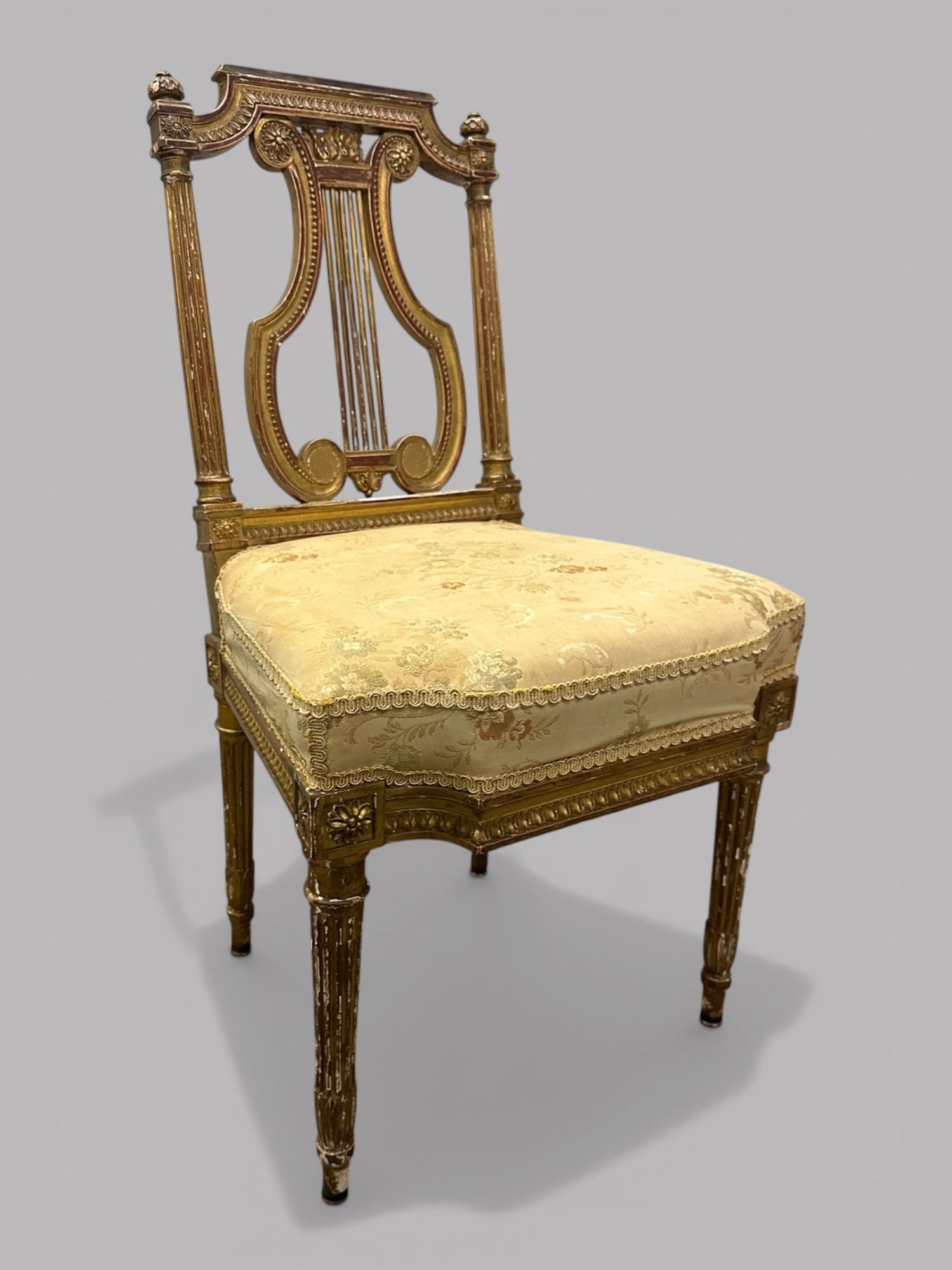 French Louis XVI Style Gilt Carved Chair With Lyre Shaped Back: H: 33 1/4 x w: 18 x d: 17 inches