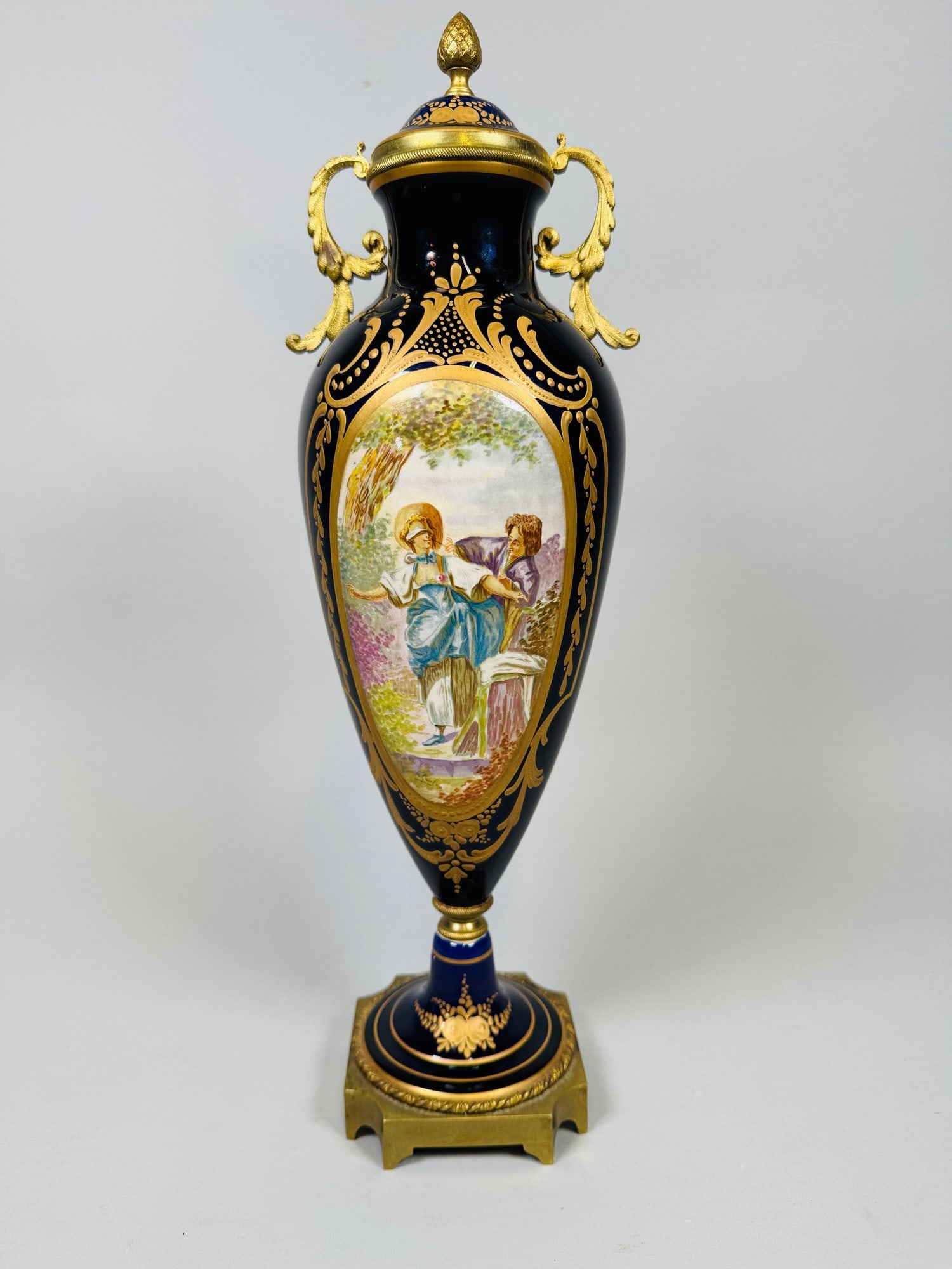 French Gilt Bronze Mounted Porcelain Covered Urn With Oval Portrait Cartouche: H: 16 inches x w: 4 inches x d: 4 inches