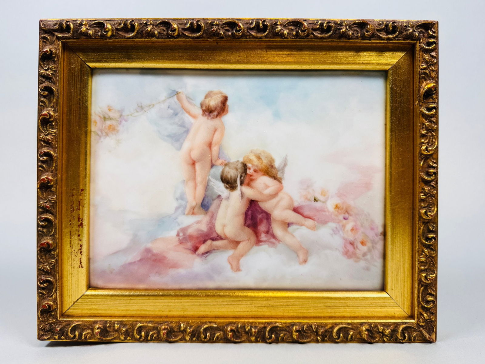 T&V Limoges Porcelain Plaque Of Putti, C. 1900: Impressed number on back: 107 mounted in modern frame h: 7 1/2 x w: 9 1/2 inches (as framed); h: 7 x w: 5 1/4 (sight)CONDITION: frame has repaired chip