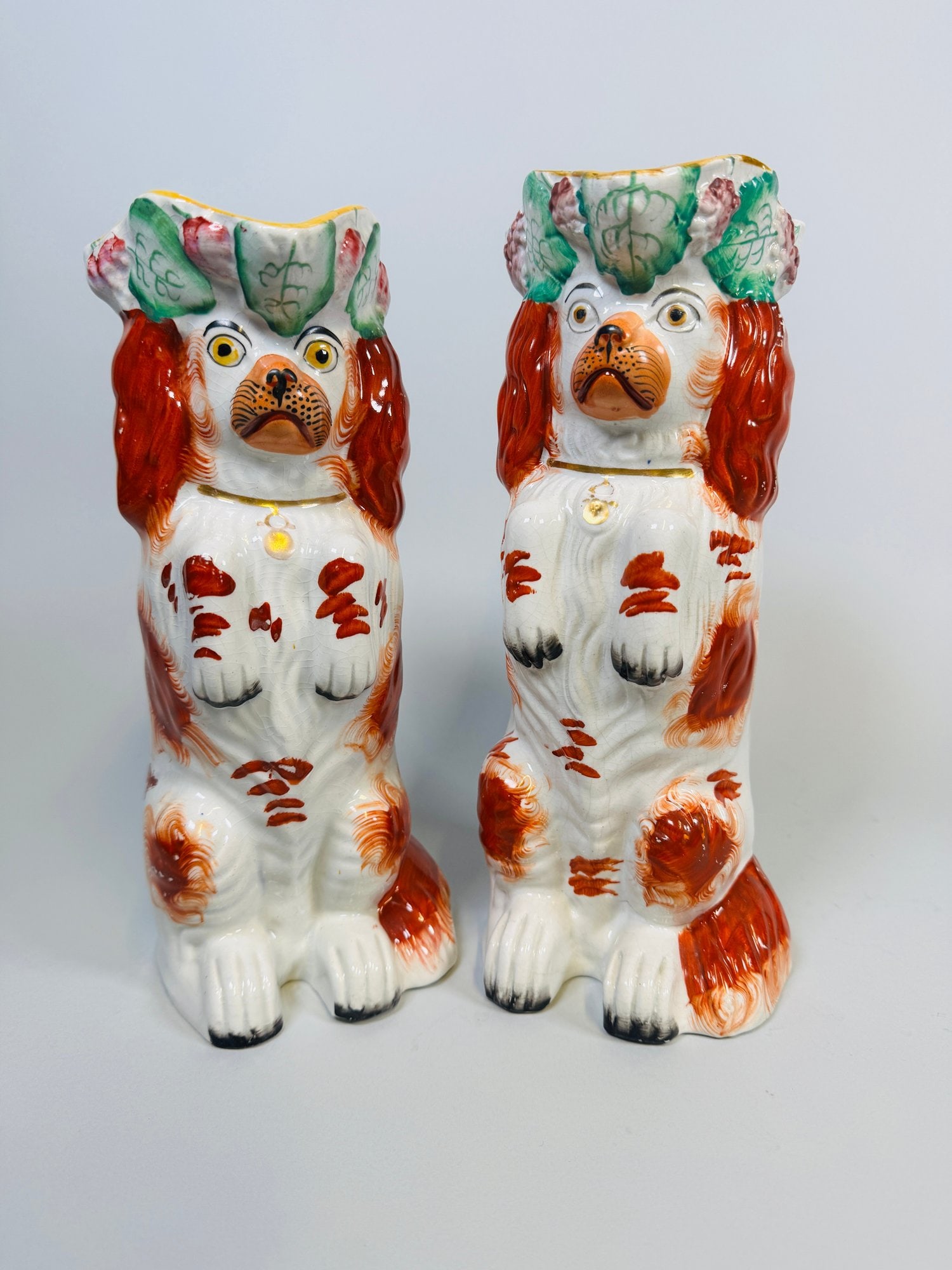 Two English Staffordshire Begging Spaniel Dog Pitchers: H: 10 inches x w: 3 1/2 inches one slightly smaller